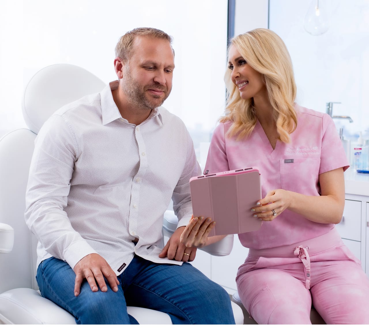 Dr. Erica Bartlett with a male patient