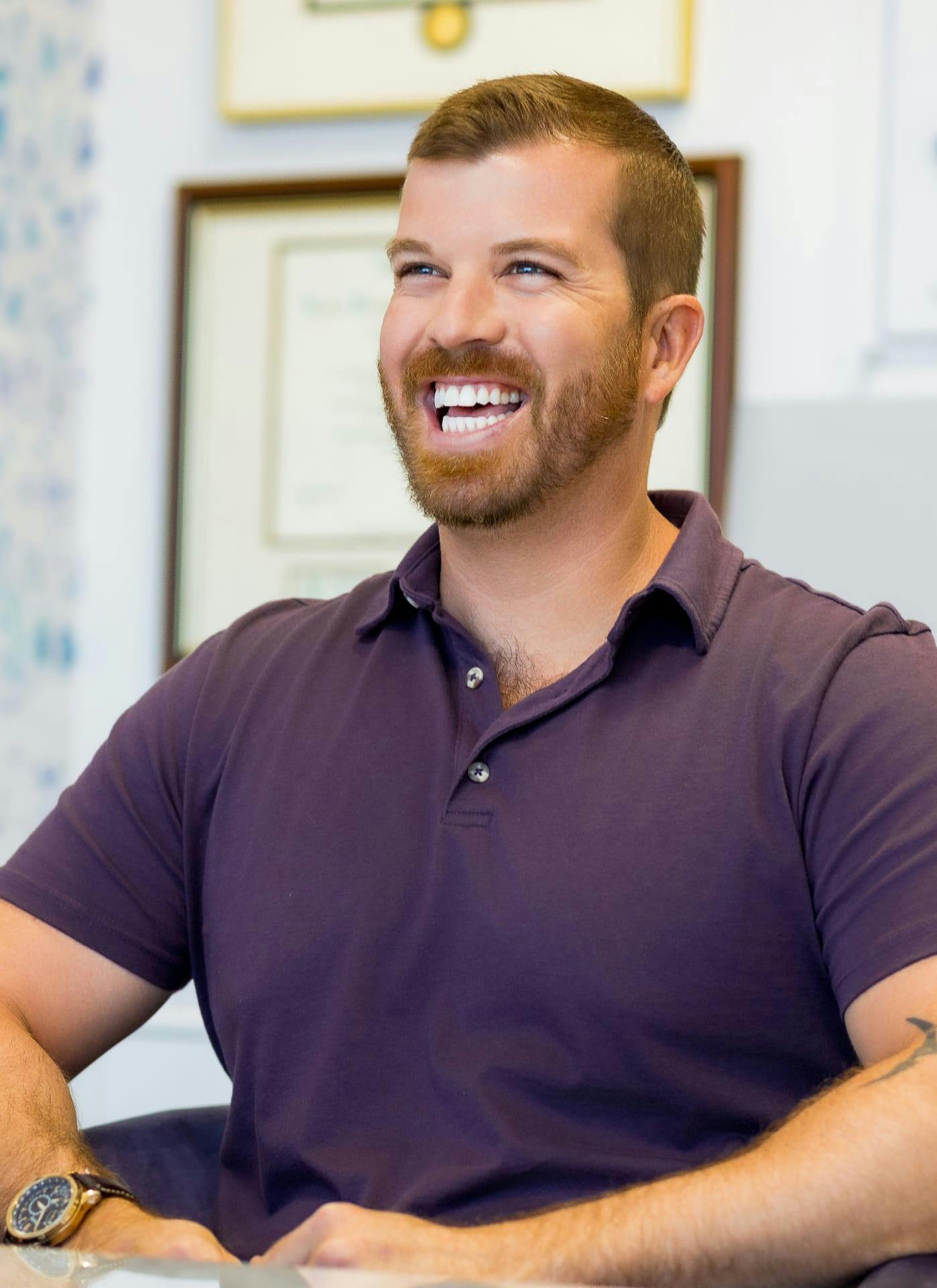 Man sitting and laughing