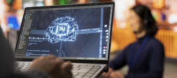 a person using a laptop a person using a laptop