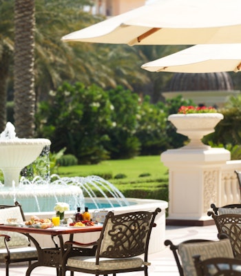 Le Jardin Terrace Outdoor dining next to a fountain