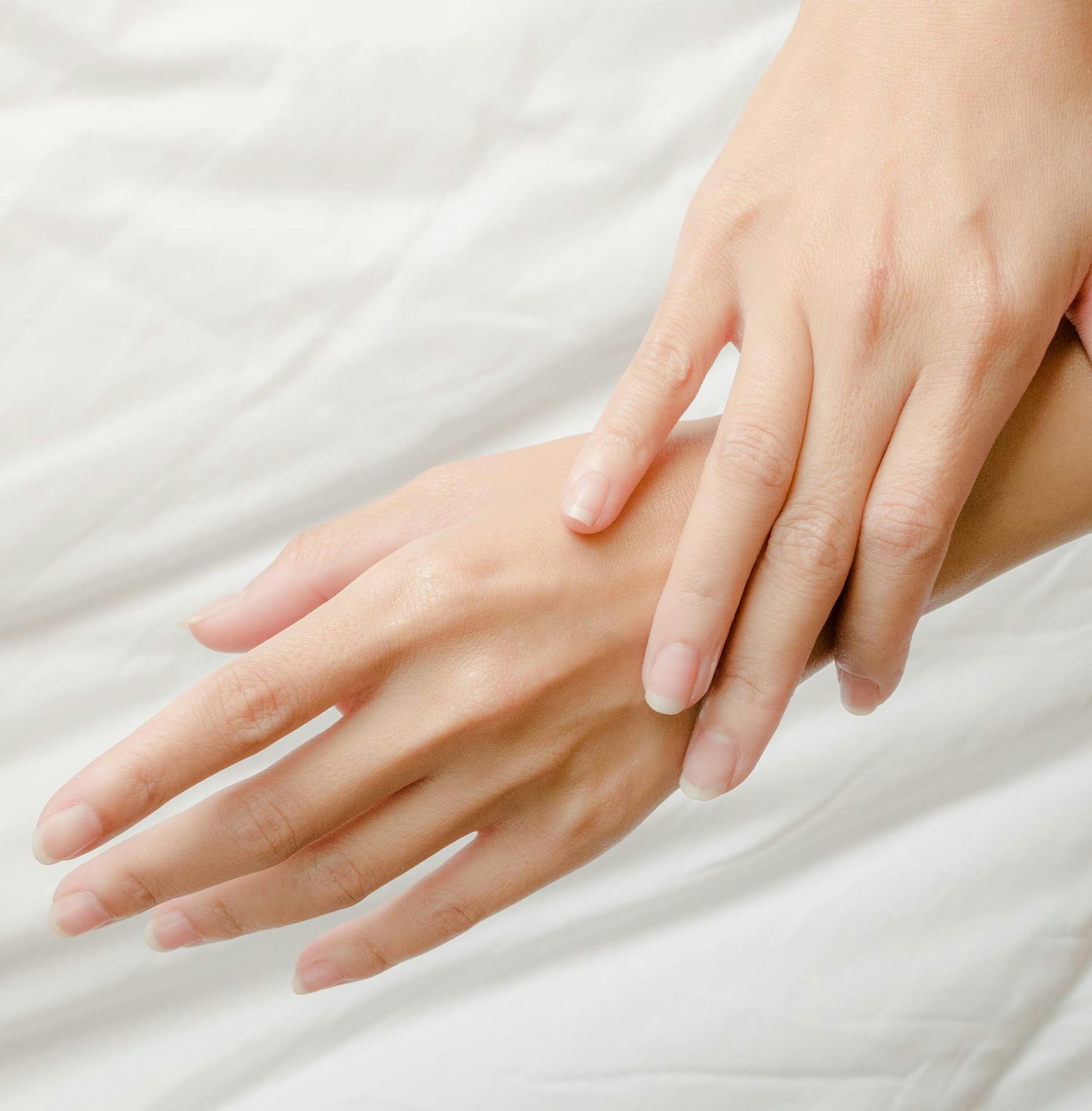 hands with one over the other