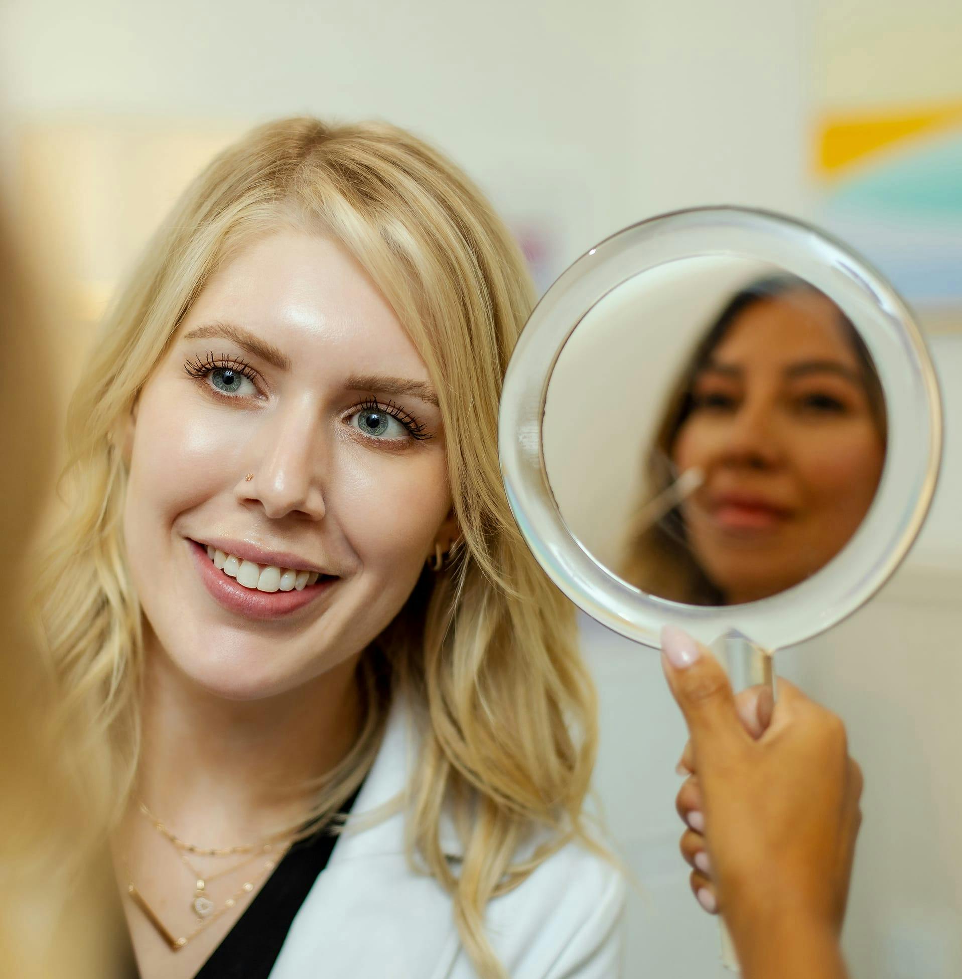 woman examining patient