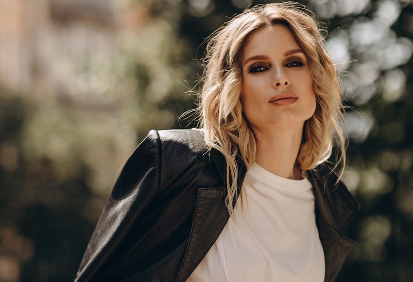 woman in black leather jacket