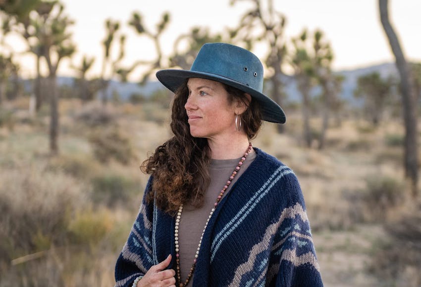 woman with blue hat and sweater