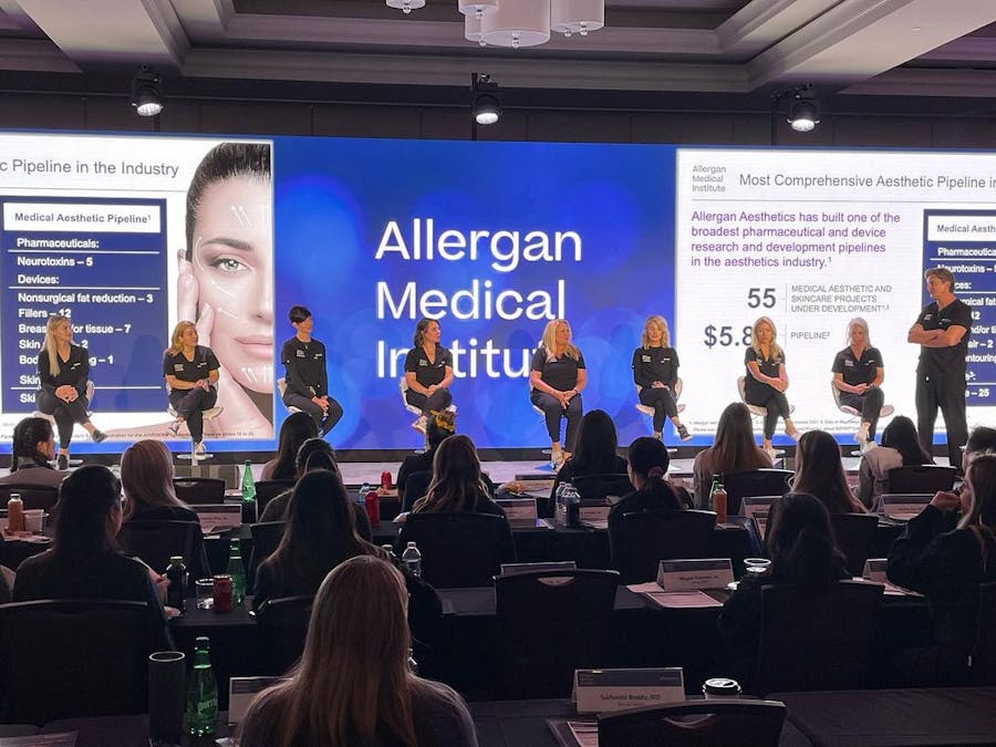 Saving Face Austin speaking at a conference