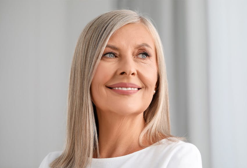 woman smiling with straight hair