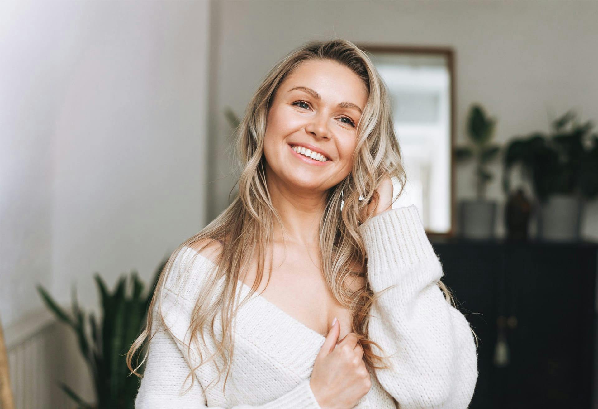 woman smiling with blonde hair