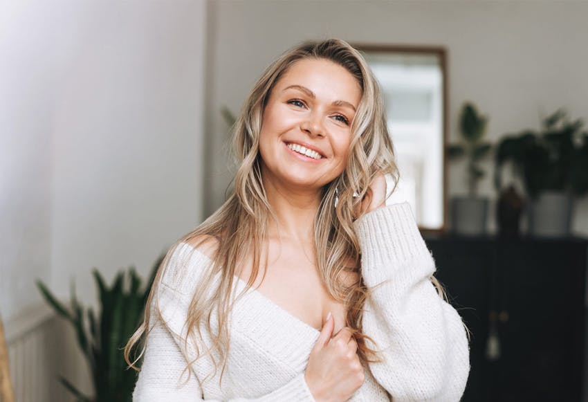 woman smiling with blonde hair
