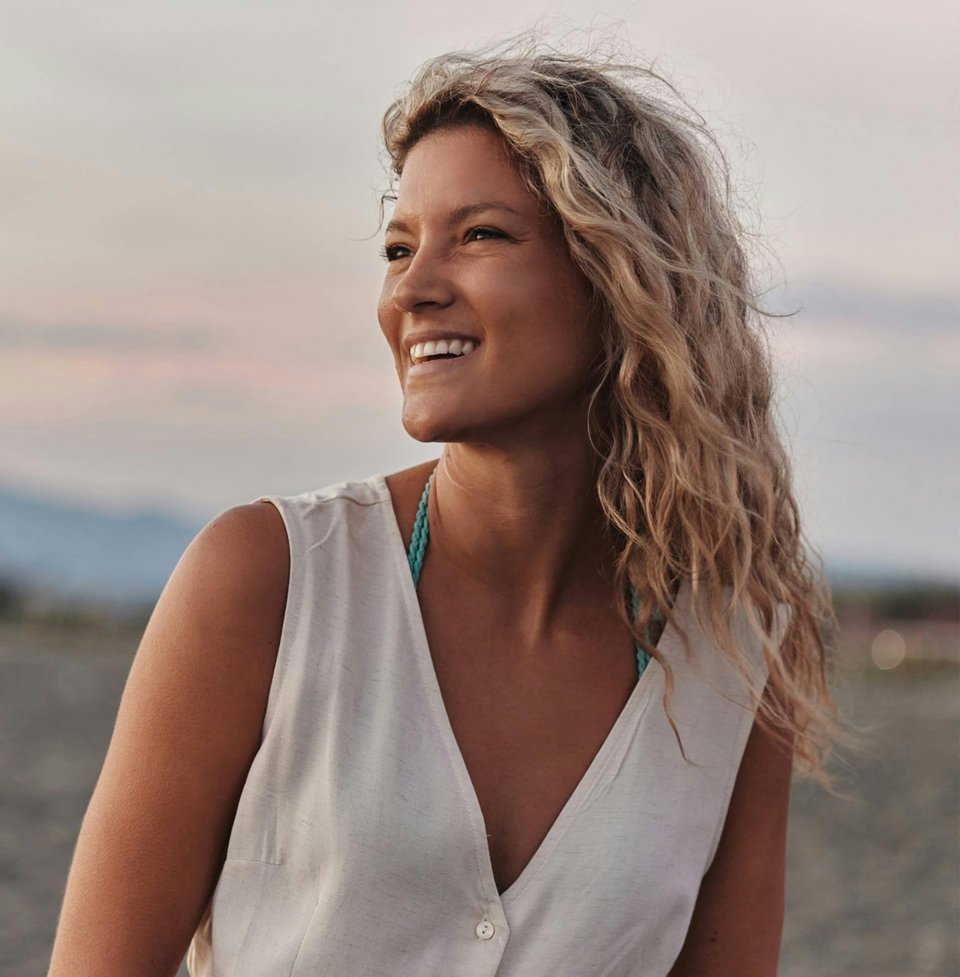 woman outside in white shirt