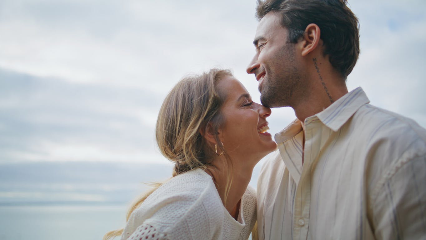 happy couple out on the beach