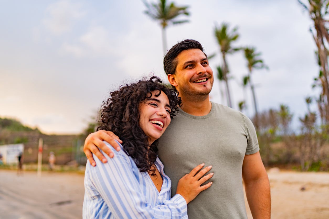 smiling couple on the beach