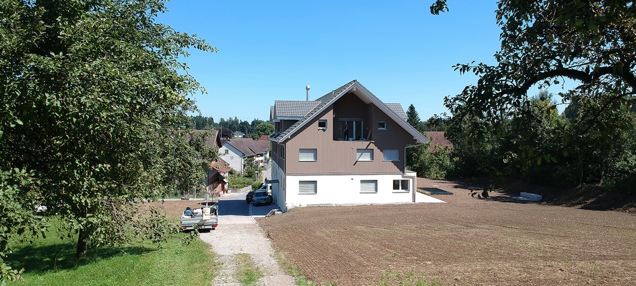 Holzbau Mehrfamilienhaus Unteroppikon