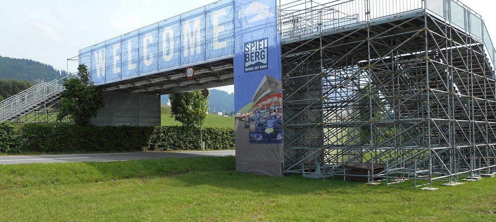 Image: For the Formula 1 Austrian Grand Prix in Spielberg, NUSSLI realized several grandstands, bridges, and an archway. Image: For the Formula 1 Austrian Grand Prix in Spielberg, NUSSLI realized several grandstands, bridges, and an archway.