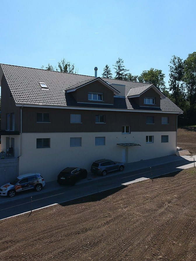 Holzbau Mehrfamilienhaus Unteroppikon