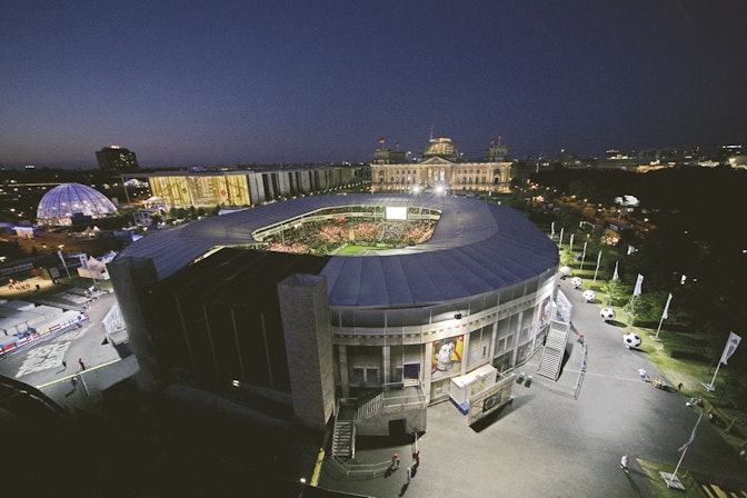 A 1:3 scale miniature of Berlin's Olympic Stadium, serving as the centerpiece of a large adidas interactive experience