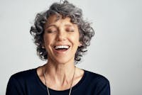 Close up of older woman laughing