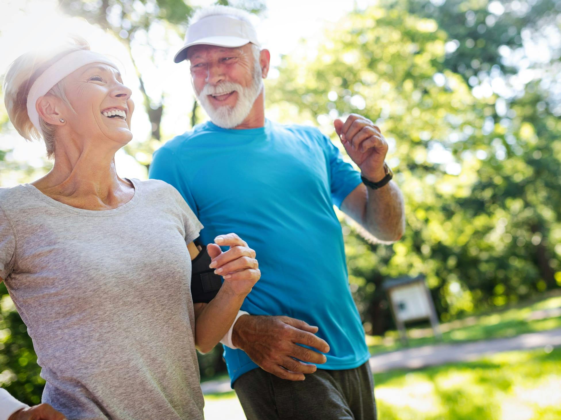 older man and woman on a jog