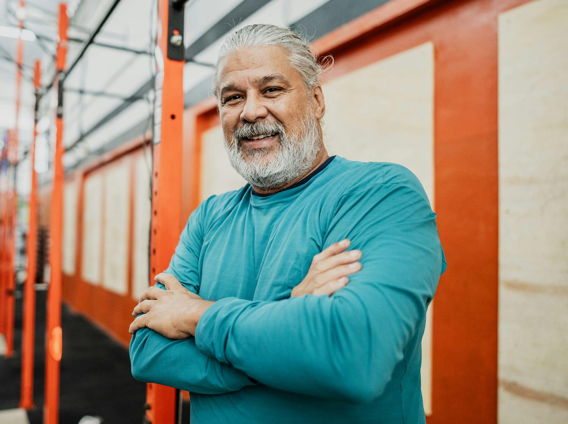 woman on gym floor, stretching