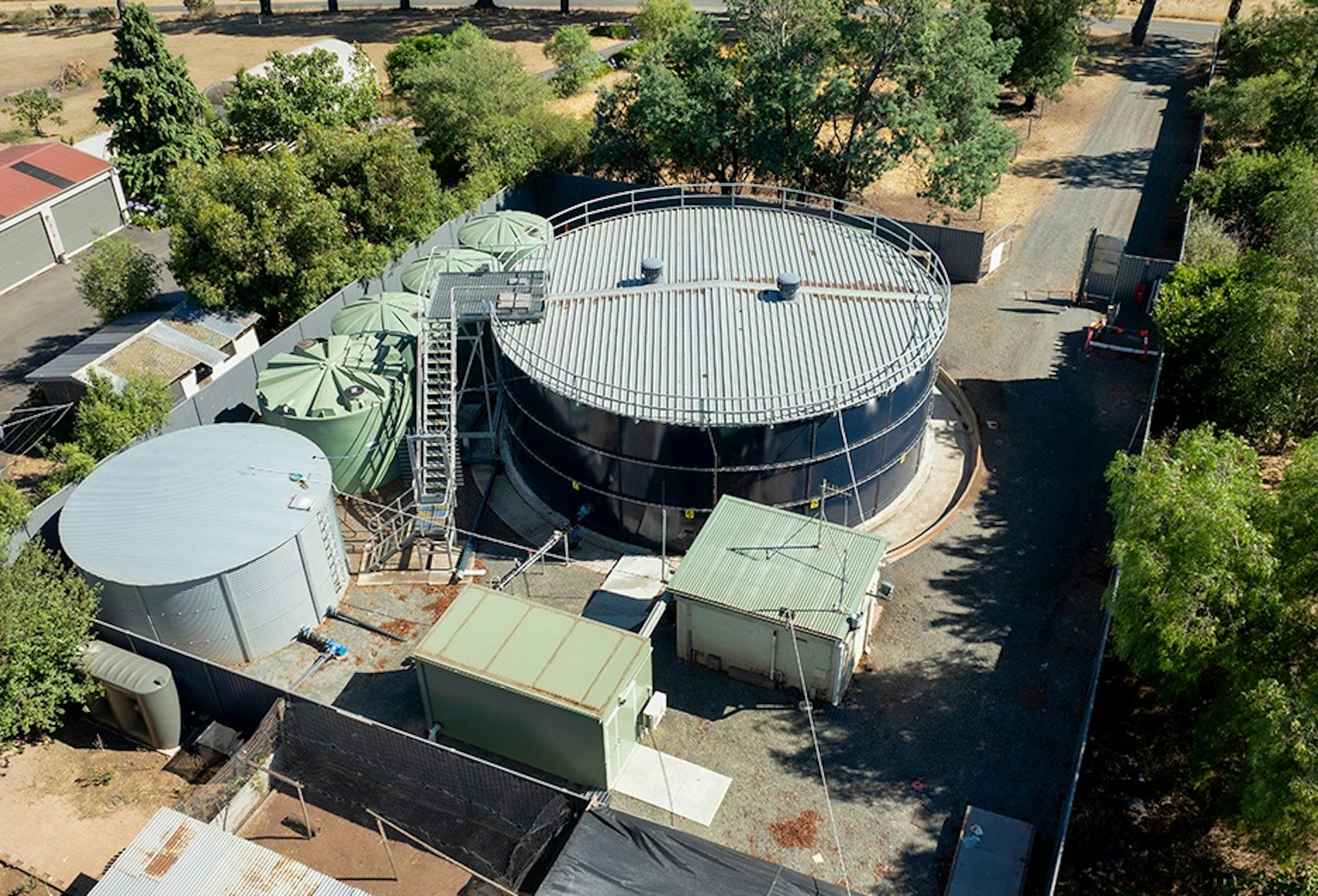 Aerial view of Learmonth Water Treatment site in Victoria showing prefabricated UV building and storage tanks. Aerial view of Learmonth Water Treatment site in Victoria showing prefabricated UV building and storage tanks.