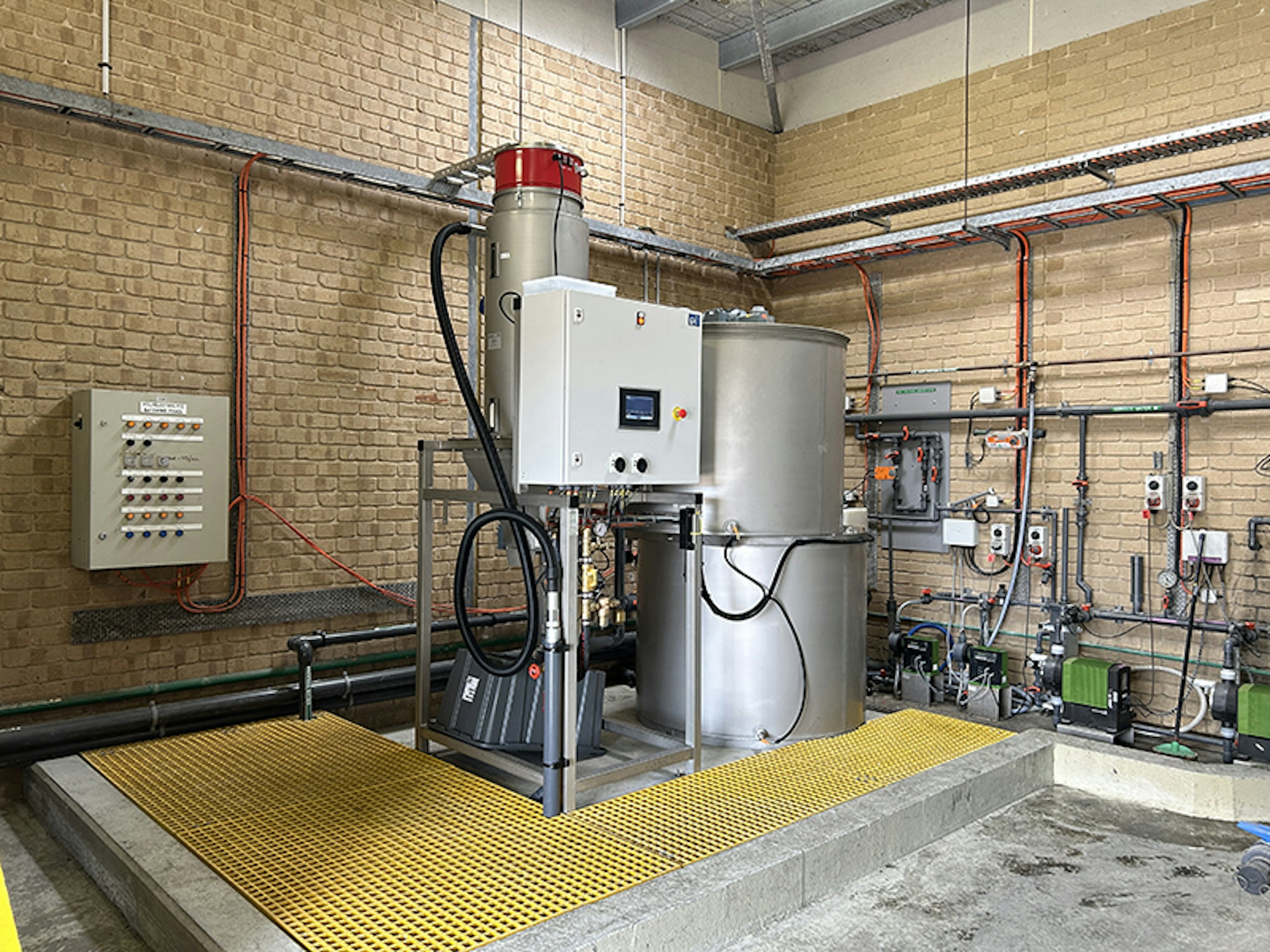 Polymer batching system with integrated PLC control panel at Lance Creek Polymer batching system with integrated PLC control panel at Lance Creek