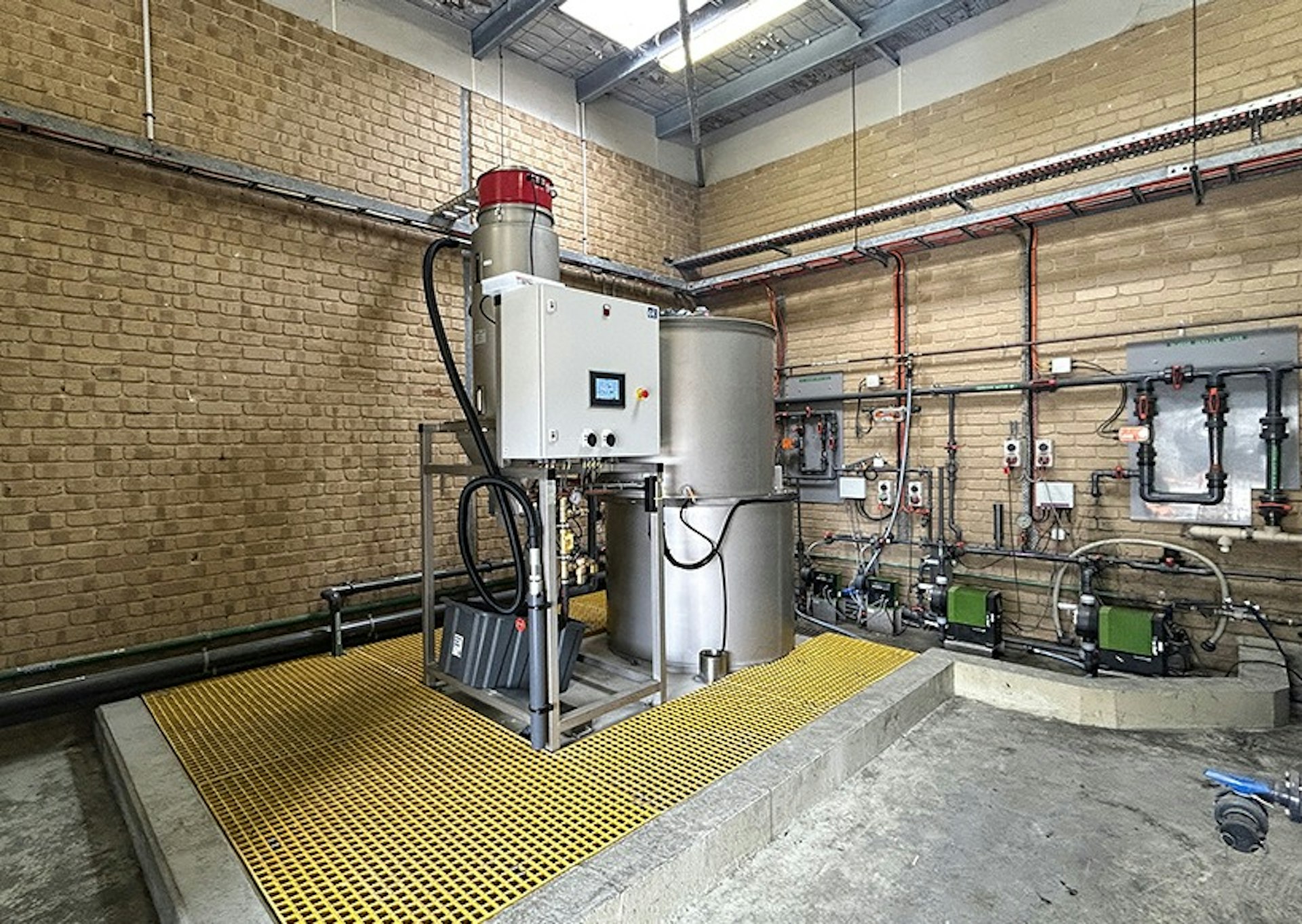 Polymer batching system with integrated PLC control panel at Lance Creek Polymer batching system with integrated PLC control panel at Lance Creek