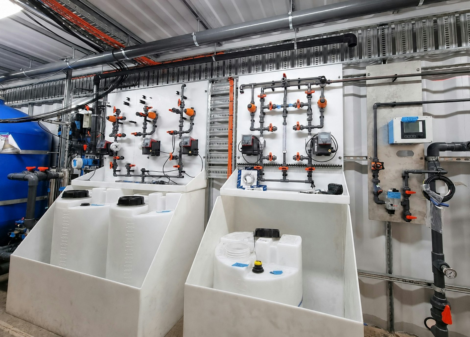Automated chemical dosing systems with integrated process control for drinking water treatment