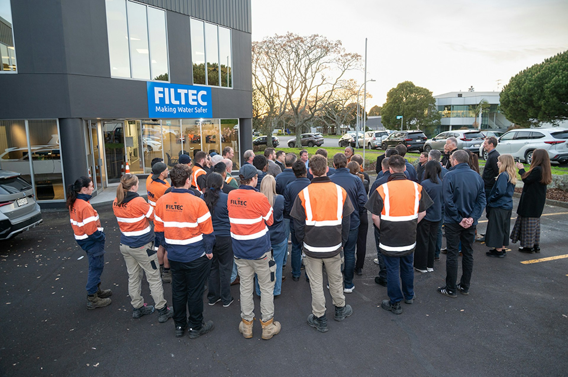 Staff gathered outside before the blessing of FILTEC House Staff gathered outside before the blessing of FILTEC House