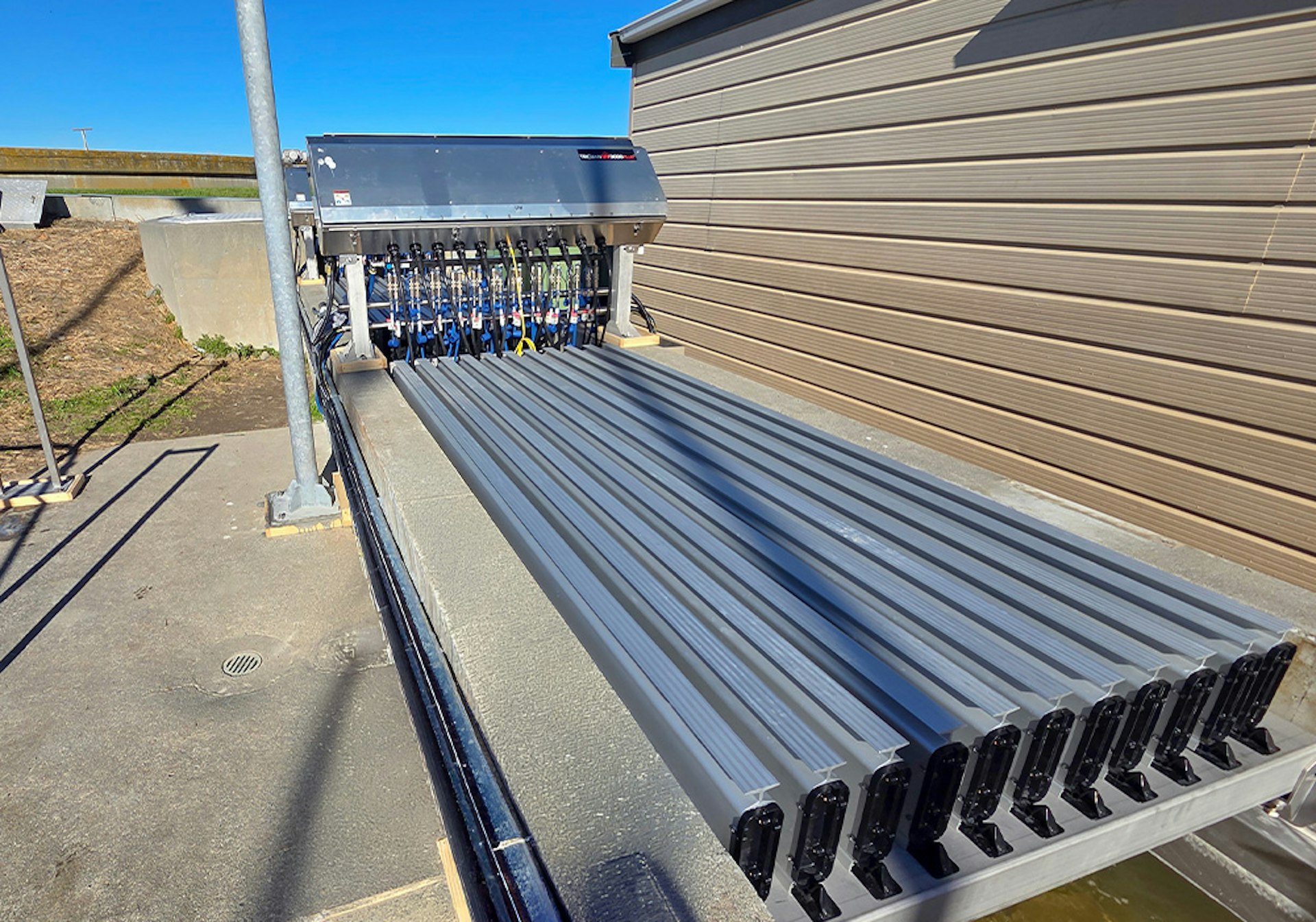 TrojanUV3000Plus modules installed in an open wastewater disinfection channel