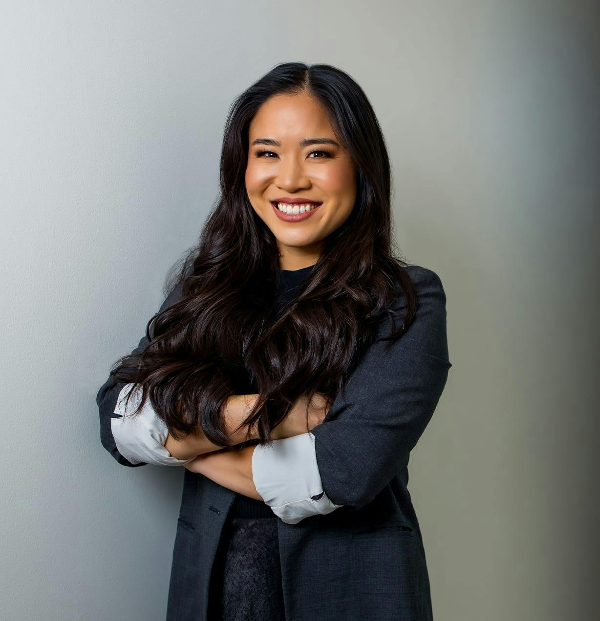 woman with her arms crossed