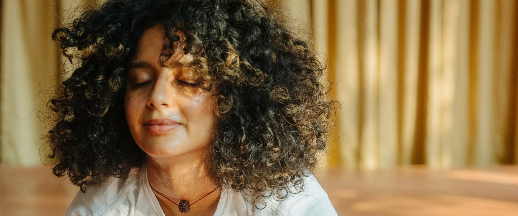 woman with very curly hair