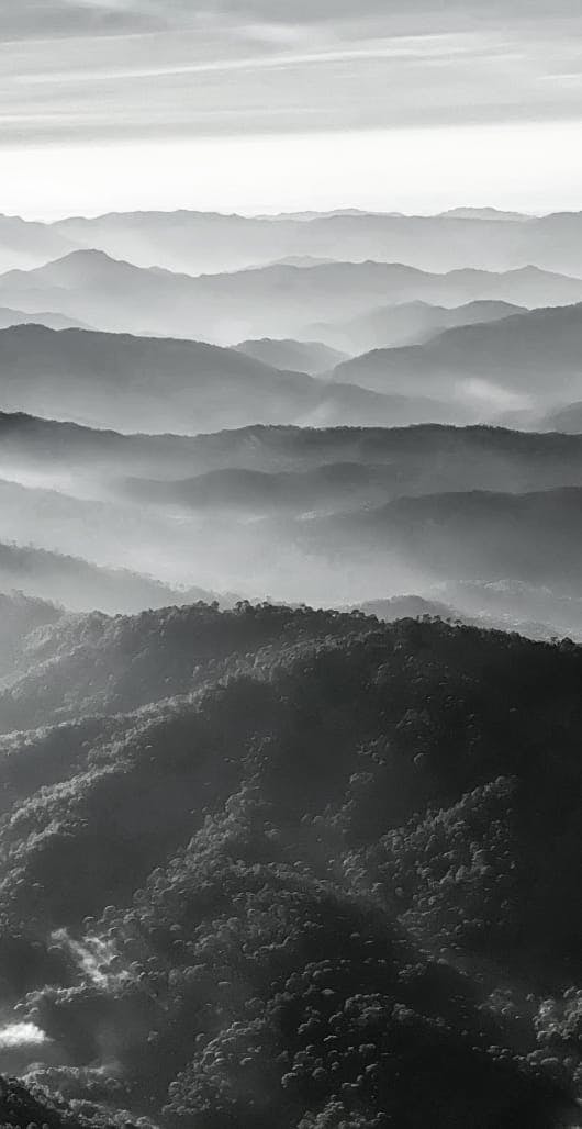 greyscale of mountain hills
