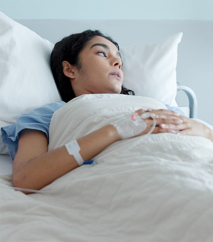 woman laying in a hospital bed