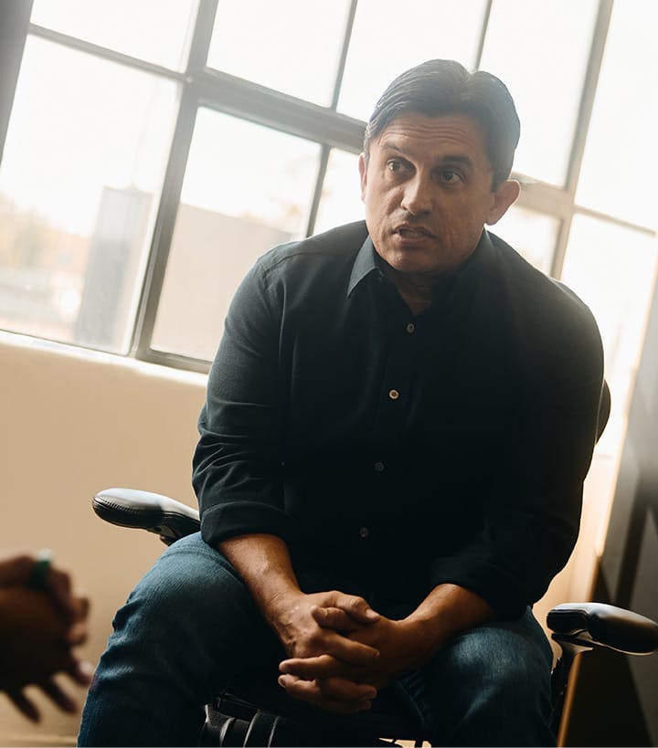 Fassold talking to a client