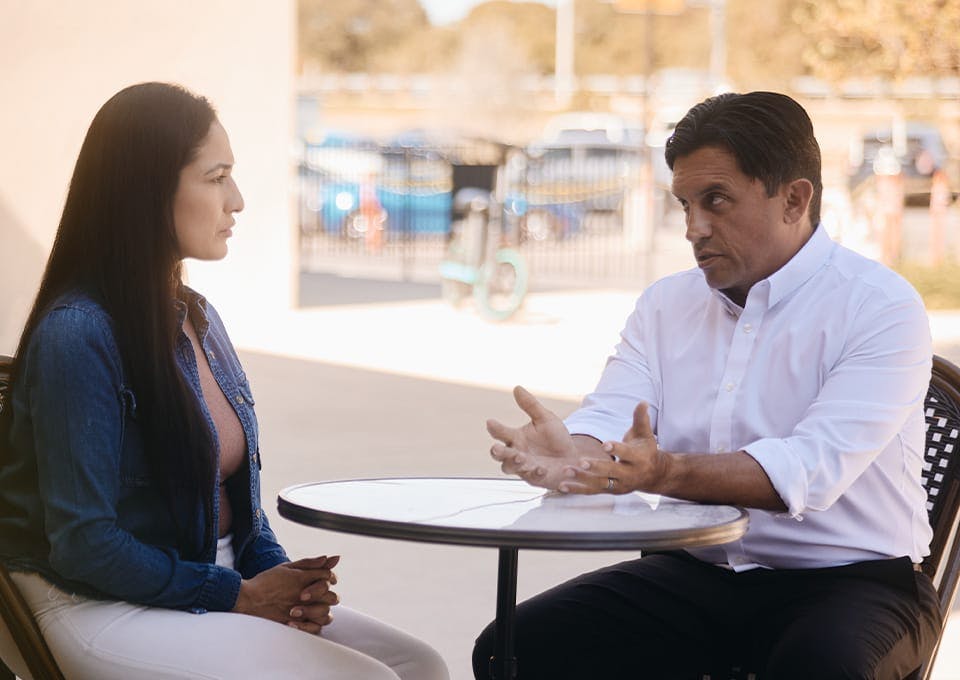 Fassold talking to a client