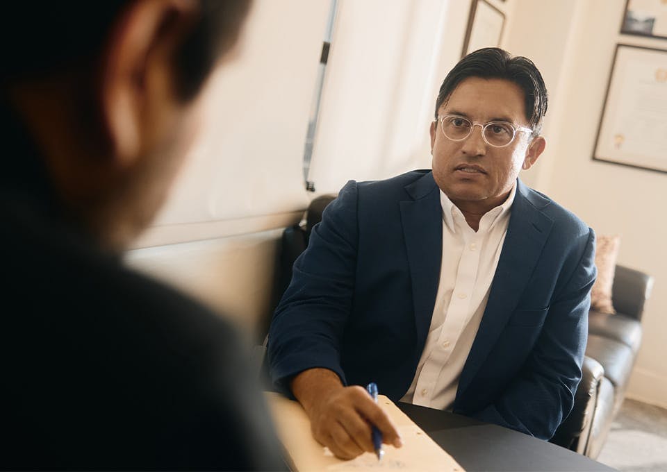 Fassold talking to a client