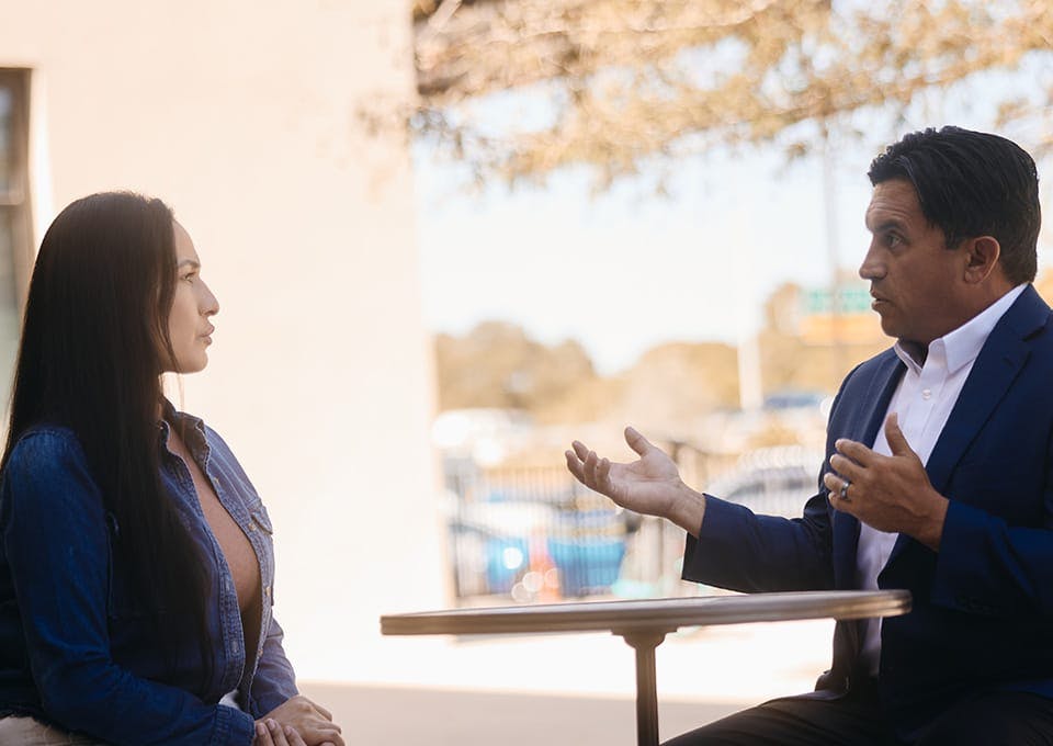 Fassold talking to a client