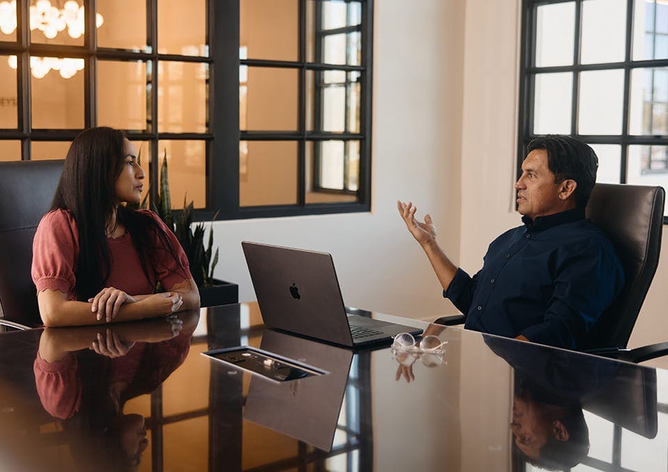 Fassold talking to a client