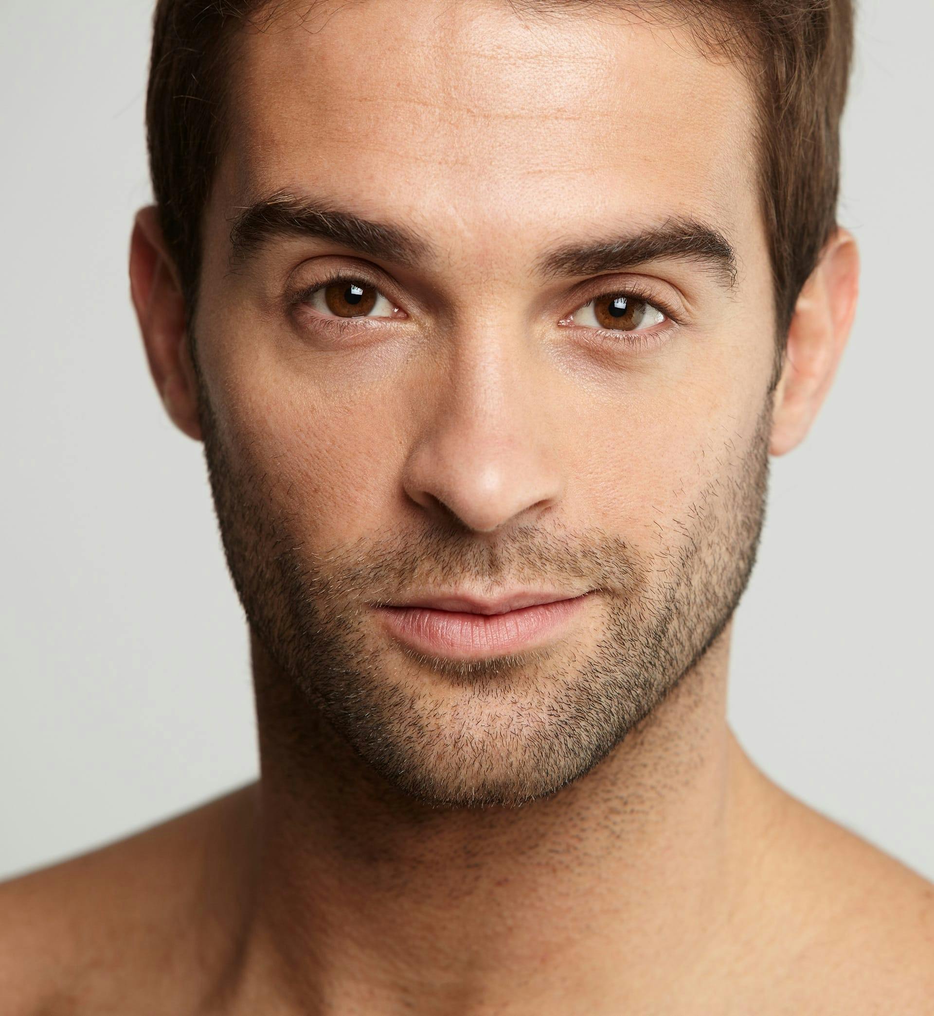 man with a five o clock shadow