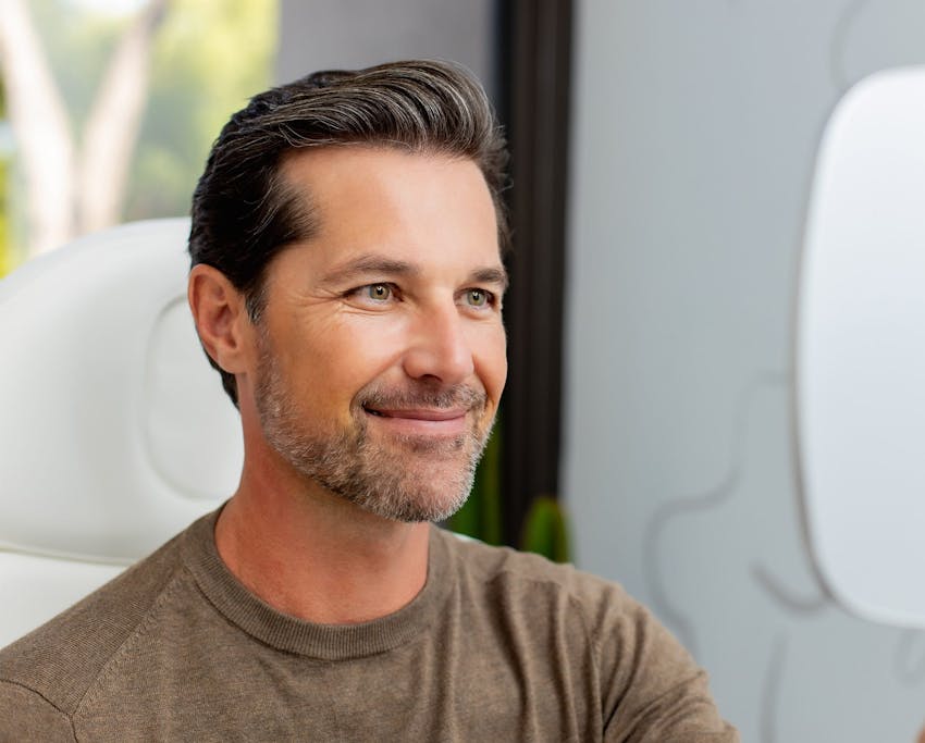 man looking in a mirror