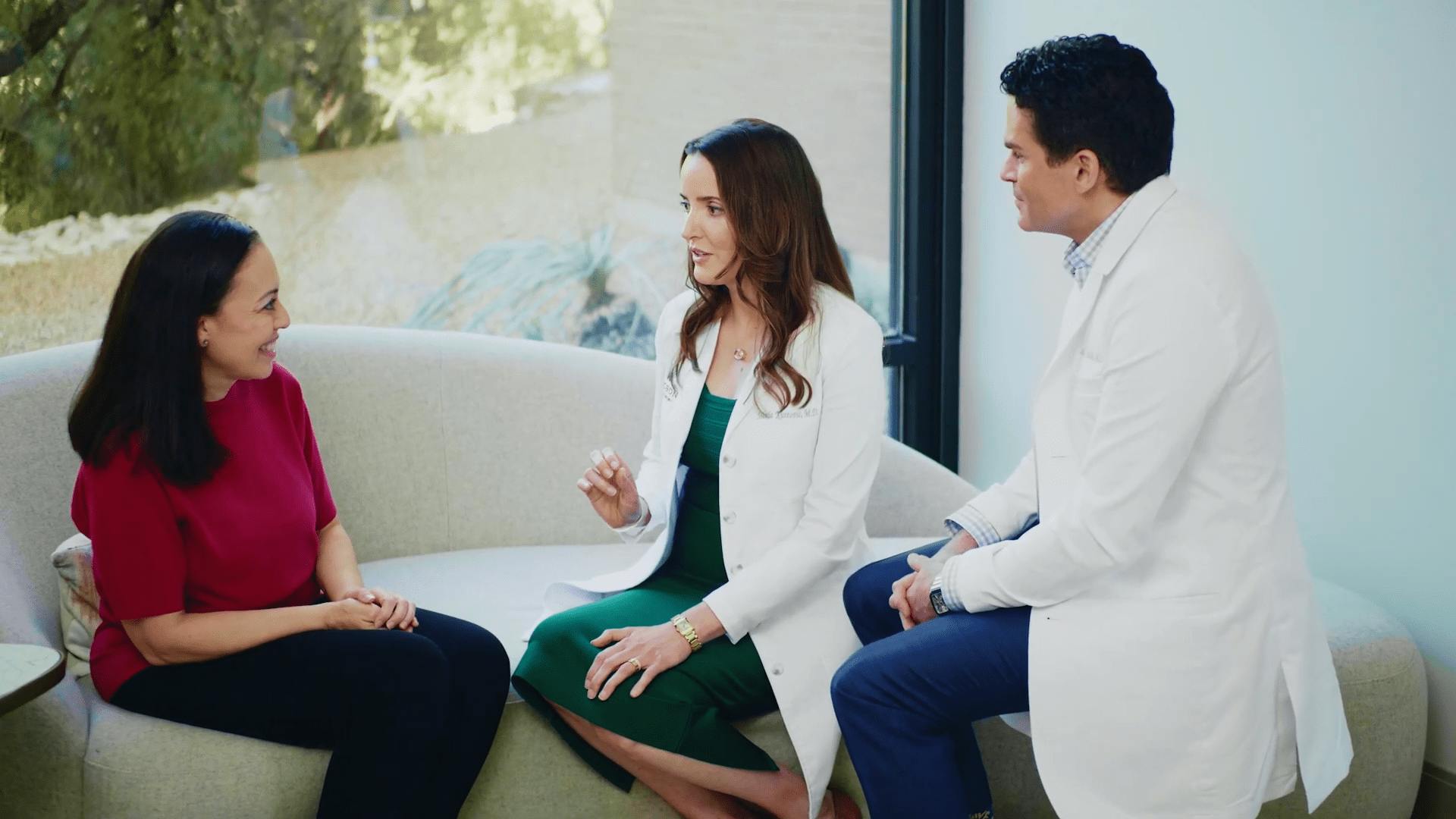 doctors talking to patient