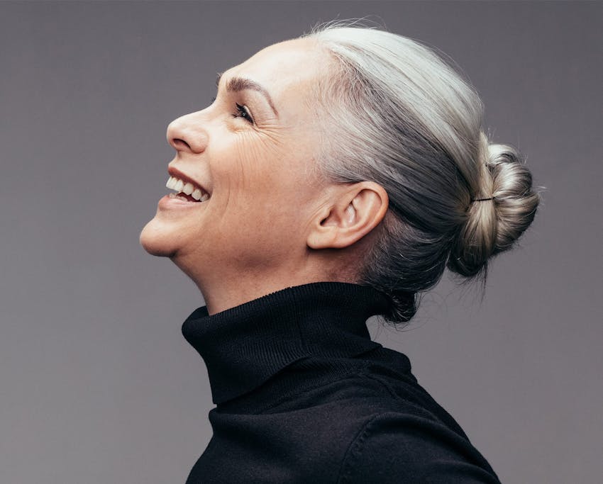 woman looking up and smiling