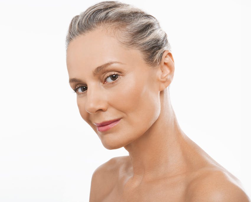 womam with her hair pulled back into a bun