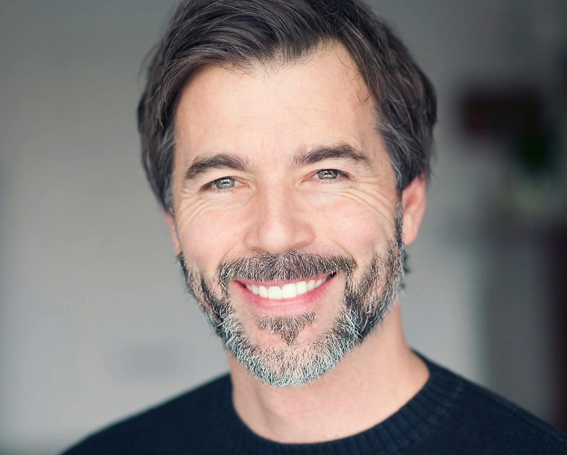 handsome man with a salt and pepper beard
