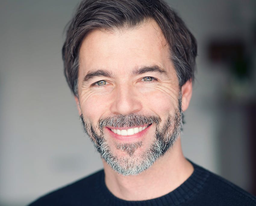 handsome man with a salt and pepper beard