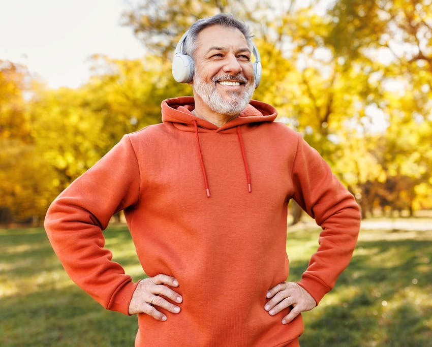 man in an orange hoodie
