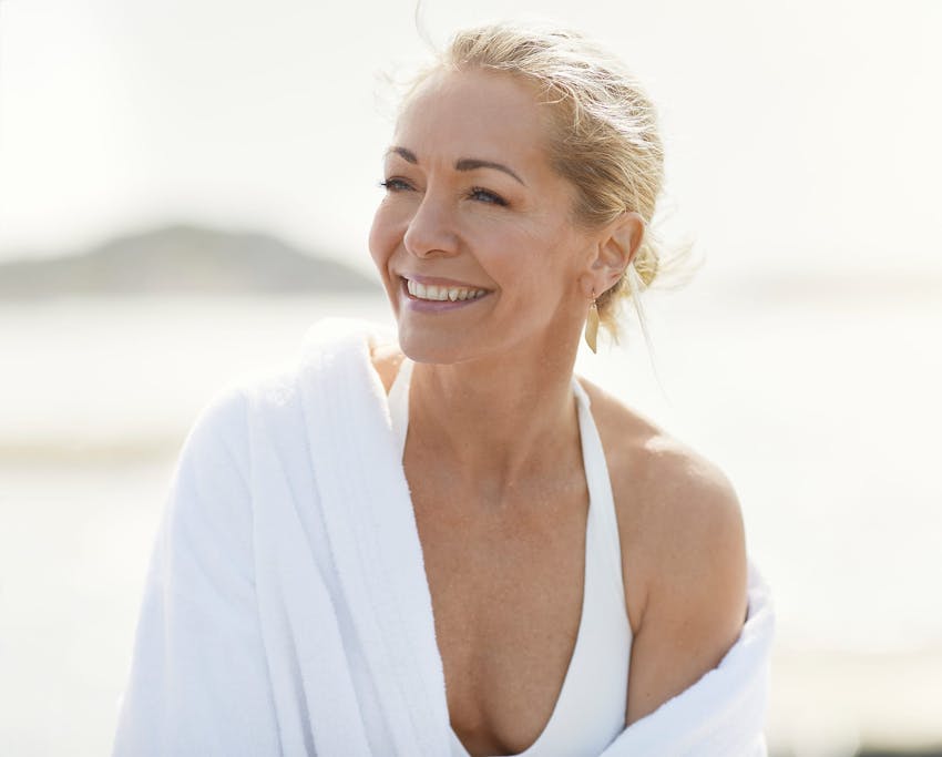 woman wearing white at the beach