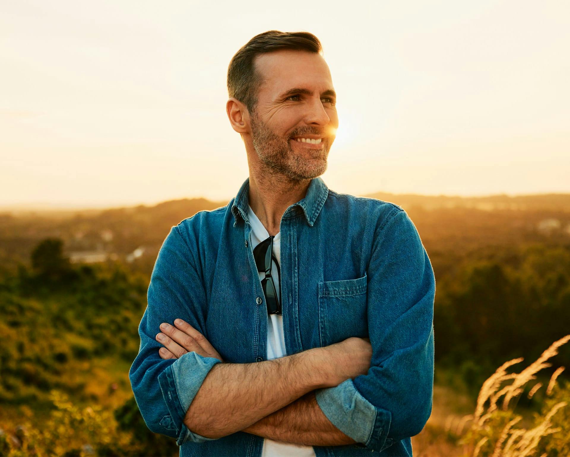 man outside smiling