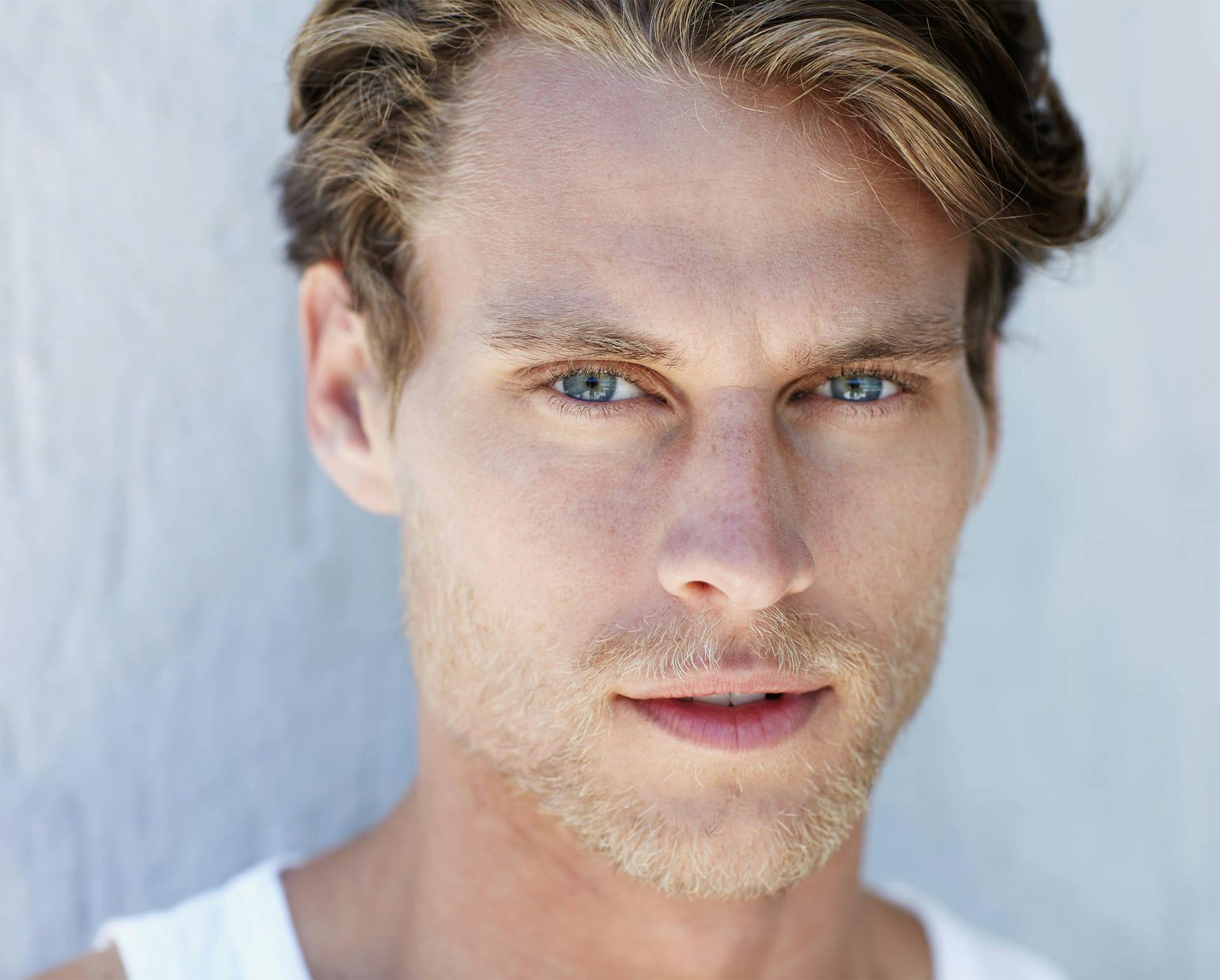 man with blonde hair and blue eyes