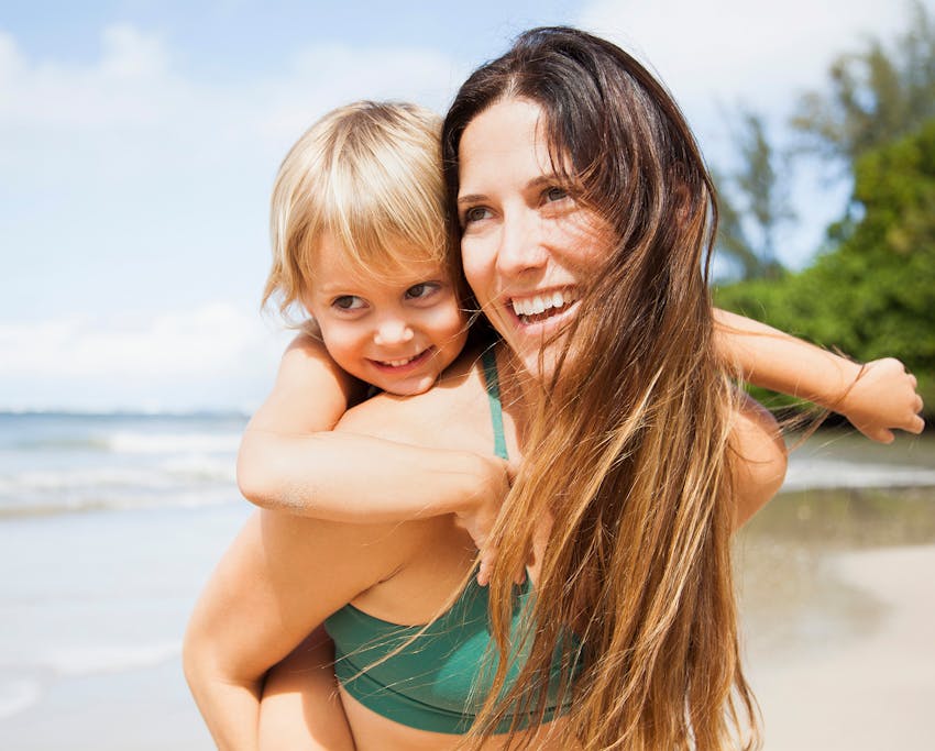woman with a child on her back