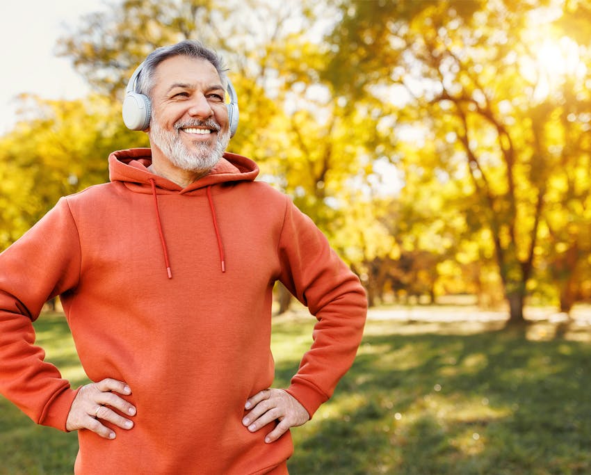 man in an orange hoodie